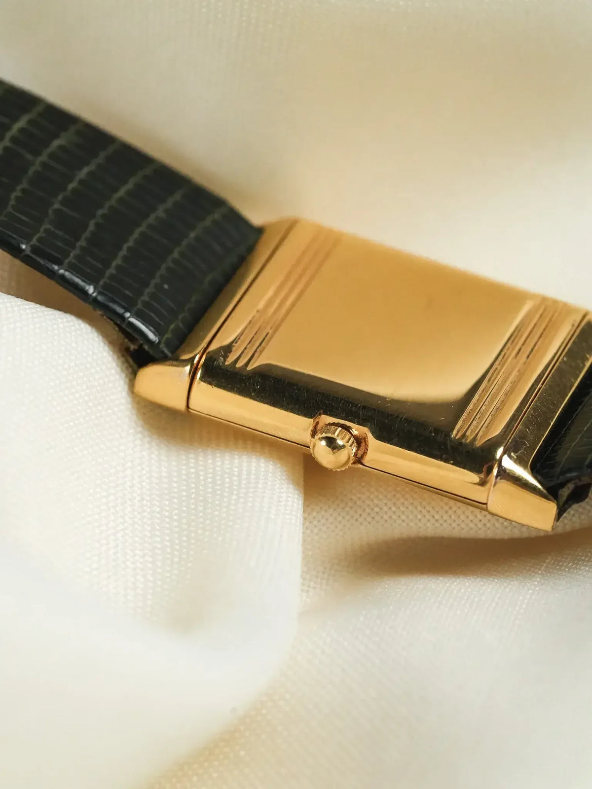Cartier Tank vintage watch with gold case and black alligator strap