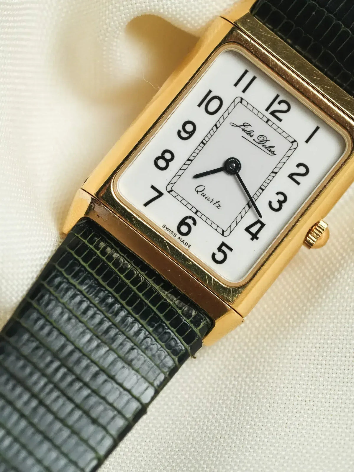Jules Delar vintage quartz watch, gold case, white dial, black alligator strap