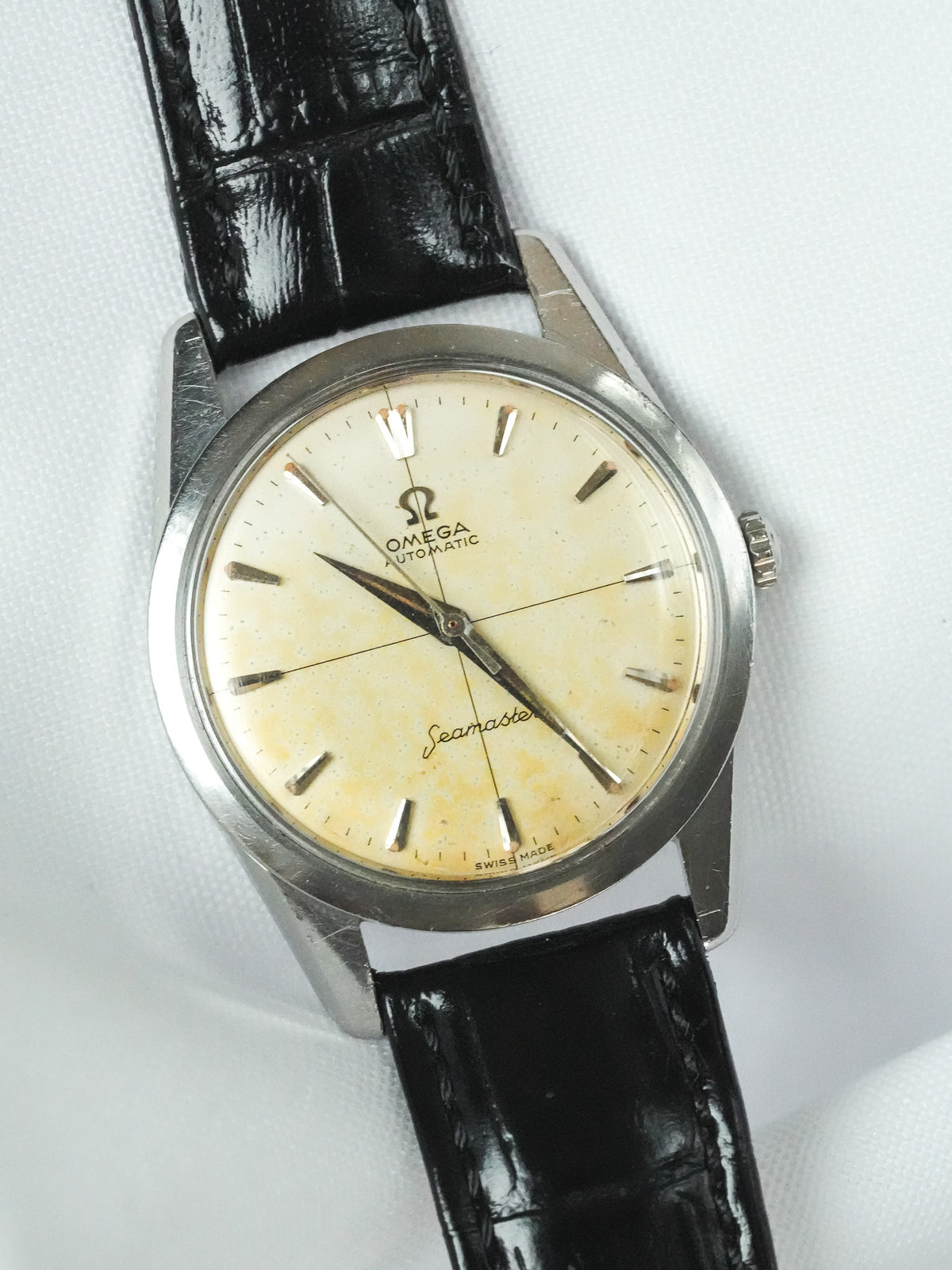 Vintage Omega Seamaster automatic watch with cream dial and black leather strap