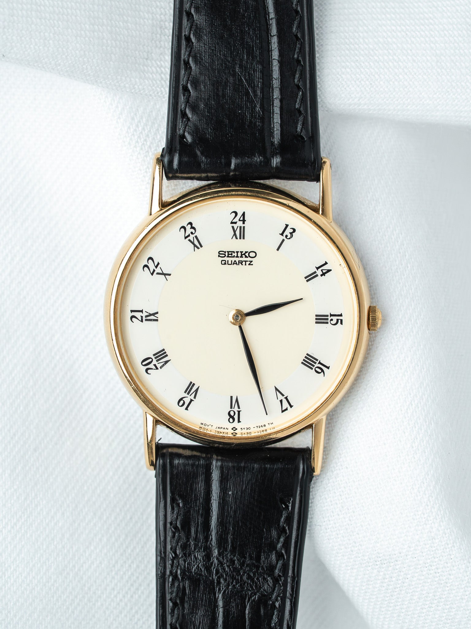 Orologio Seiko 5Y30-7000 placcato oro — quadrante 24 ore bicolore extra-piatto (1990)