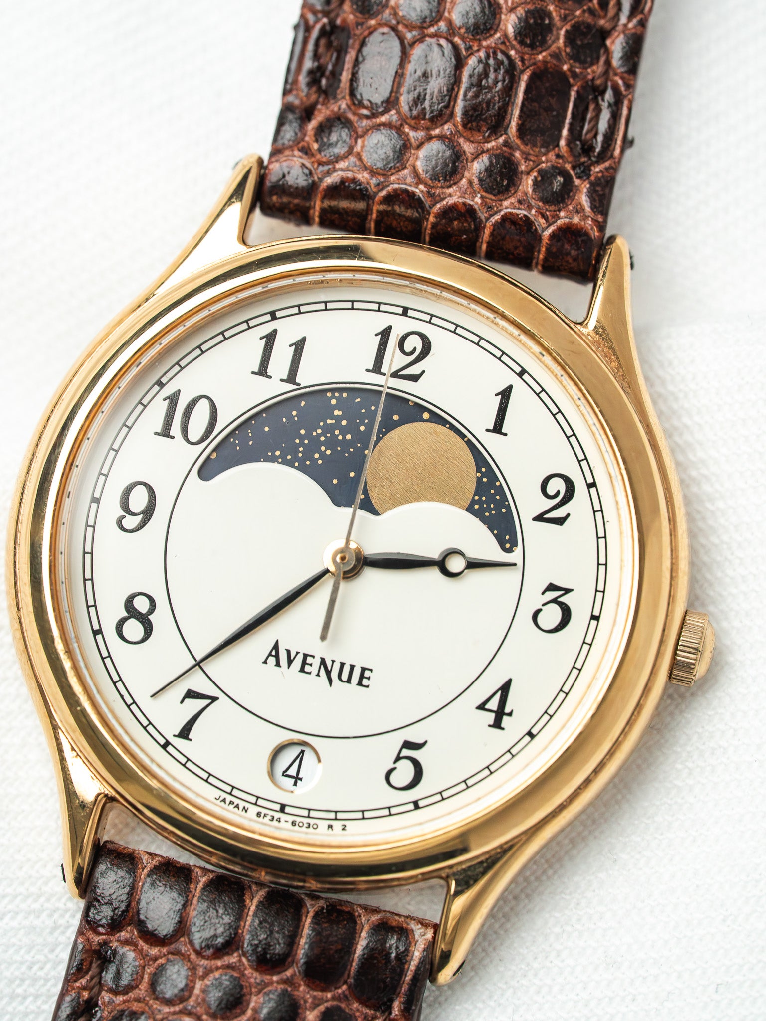 Avenue vintage watch with gold case, white dial, moon phase, brown lizard strap