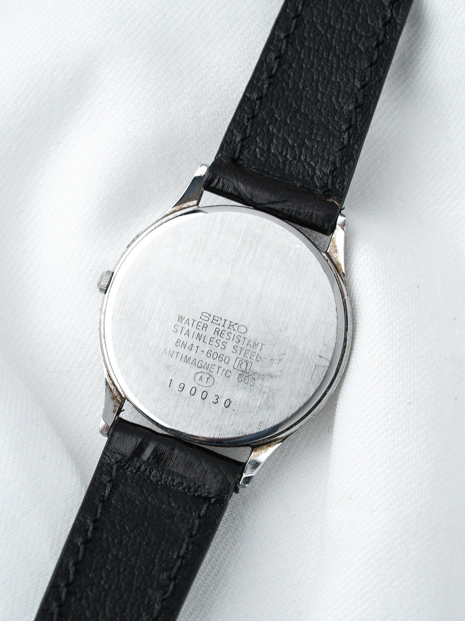 Seiko vintage watch back stainless steel with black leather strap