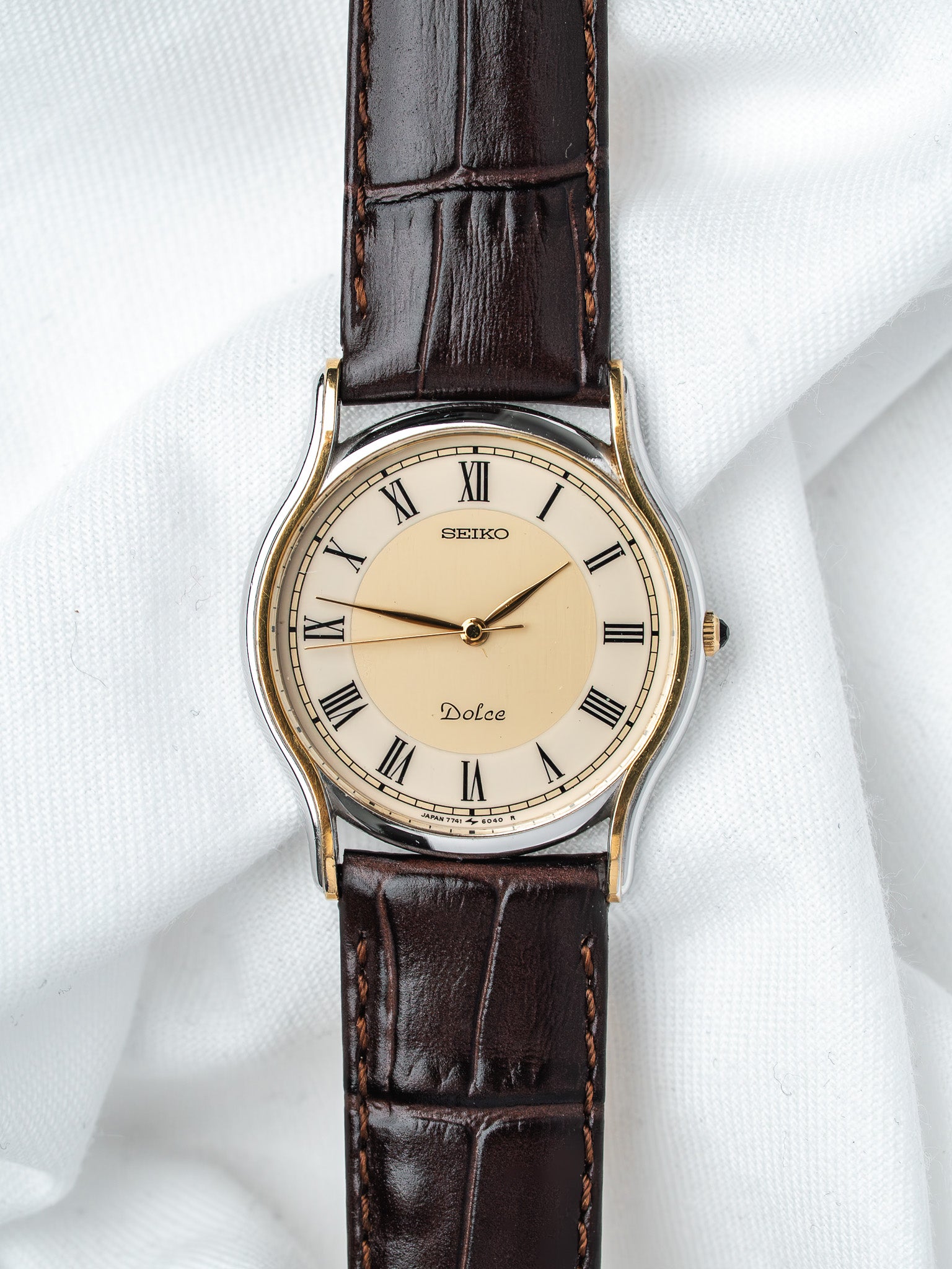 Seiko Dolce vintage watch with cream dial, Roman numerals, brown leather strap