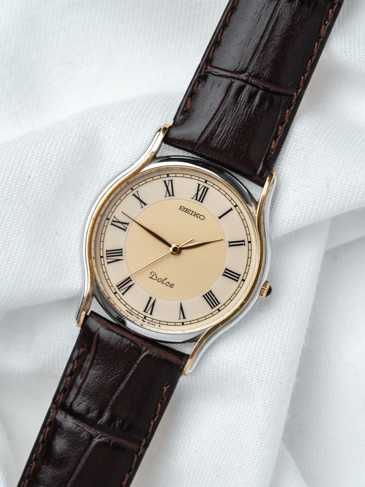 Seiko Dolce vintage watch with cream dial, Roman numerals, brown leather strap