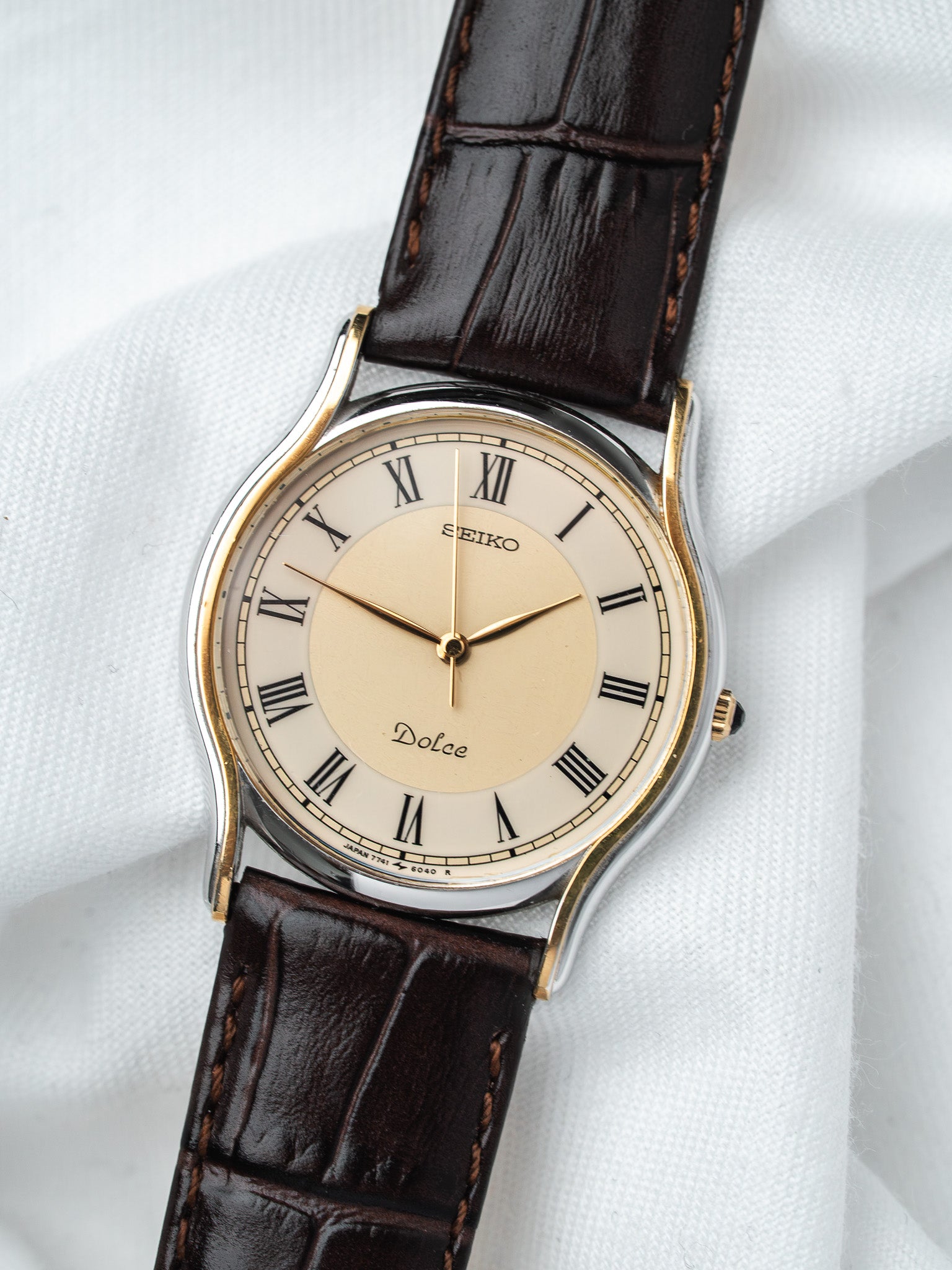 Seiko Dolce vintage watch with cream dial, Roman numerals, brown leather strap