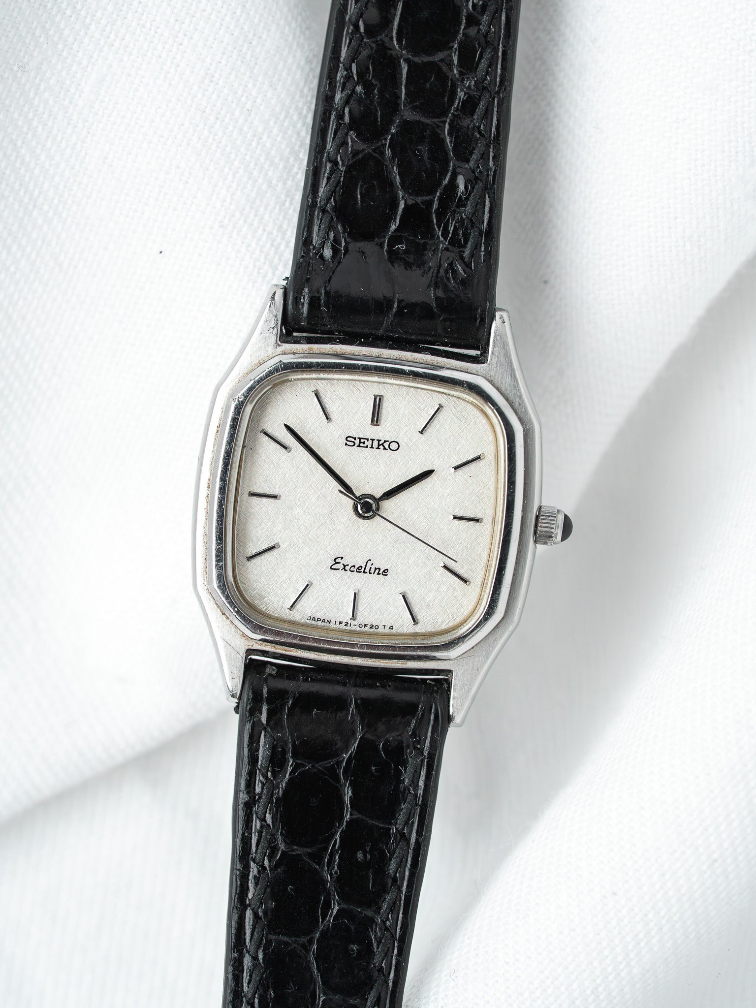 Seiko Exceline vintage watch with silver dial, black crocodile strap, octagonal case