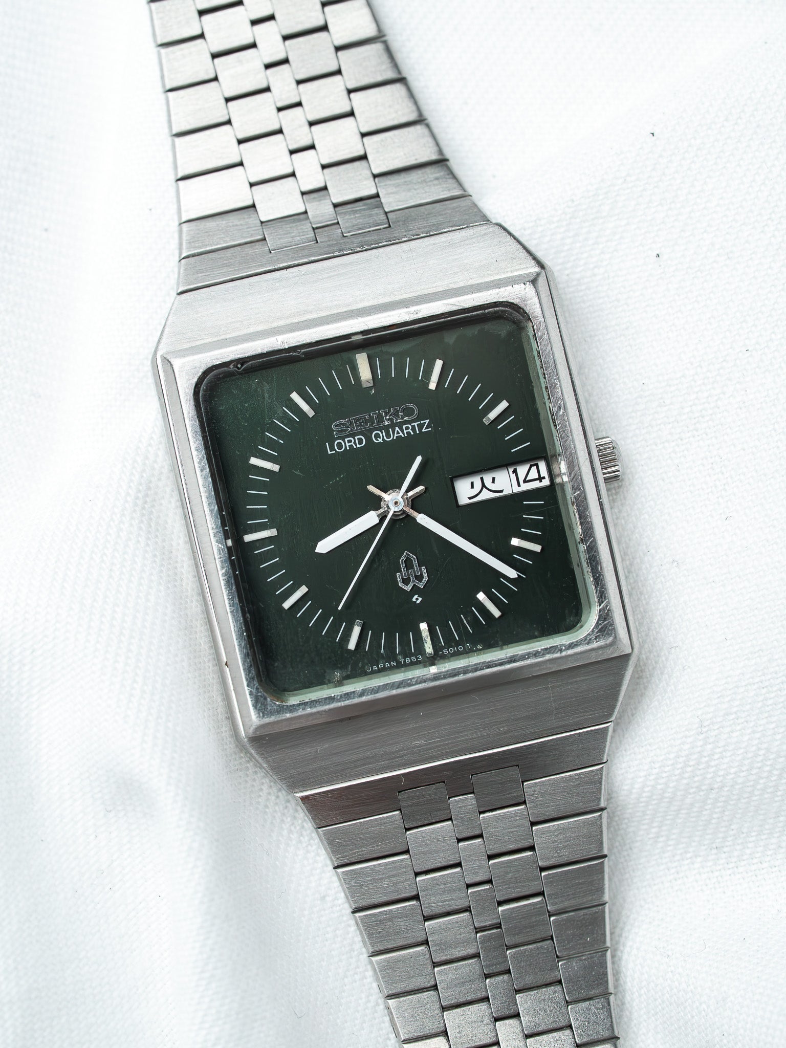 Seiko Lord Quartz vintage watch with green dial and steel bracelet