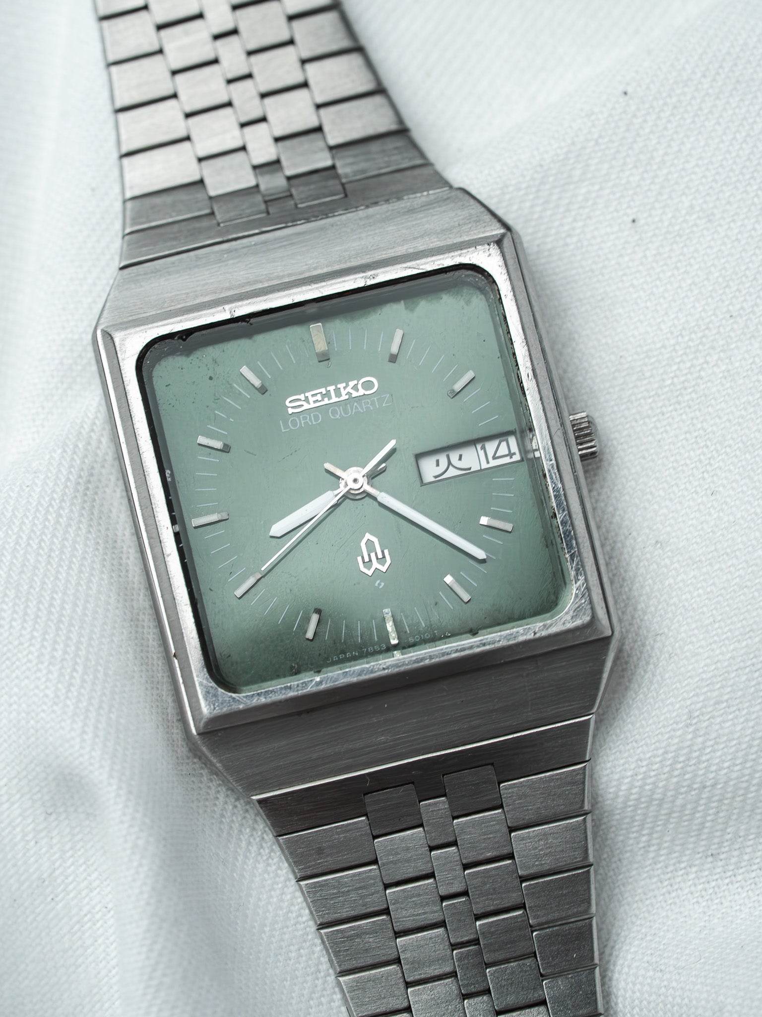 Seiko Lord Quartz vintage watch with green dial and steel bracelet