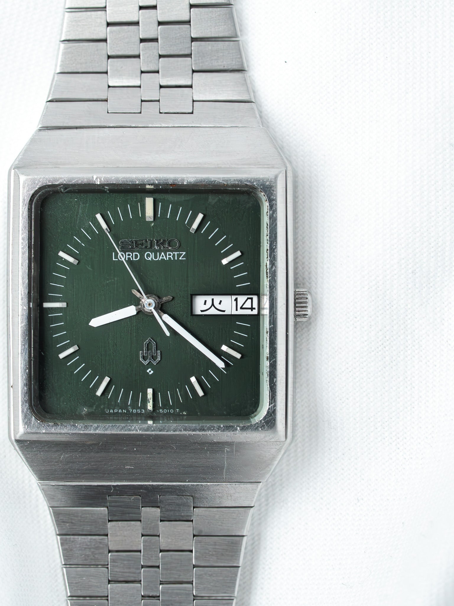 Seiko Lord Quartz vintage watch with green dial and steel bracelet