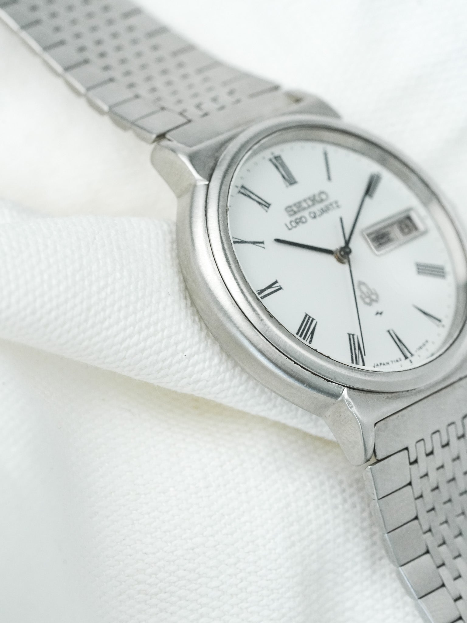 Montre Seiko Lord Quartz Vintage - Daydate Kanji Acier Romain (1979) - Atelier Victor
