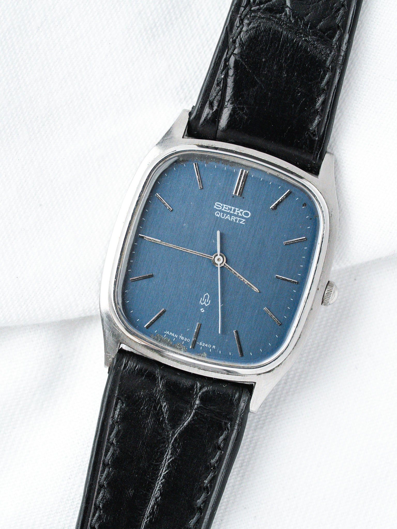 Seiko Quartz vintage watch with blue dial, steel case, black leather strap