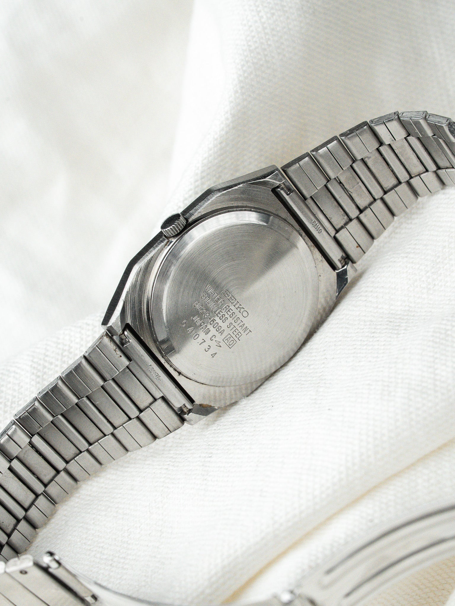 Montre Seiko SQ Vintage - Acier Date Jour Noir 8C23-509A (1985) - Atelier Victor