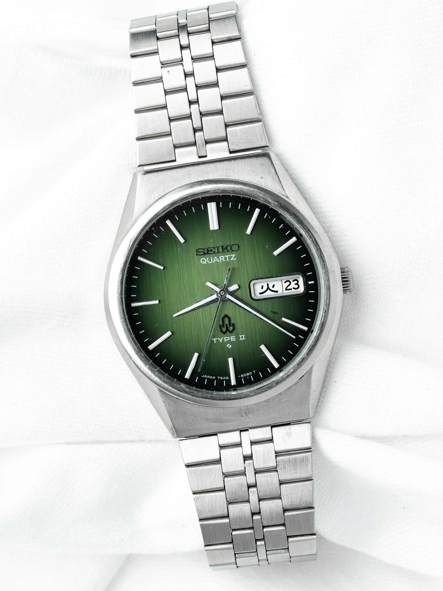 Seiko Quartz Type II vintage watch with green dial and steel bracelet