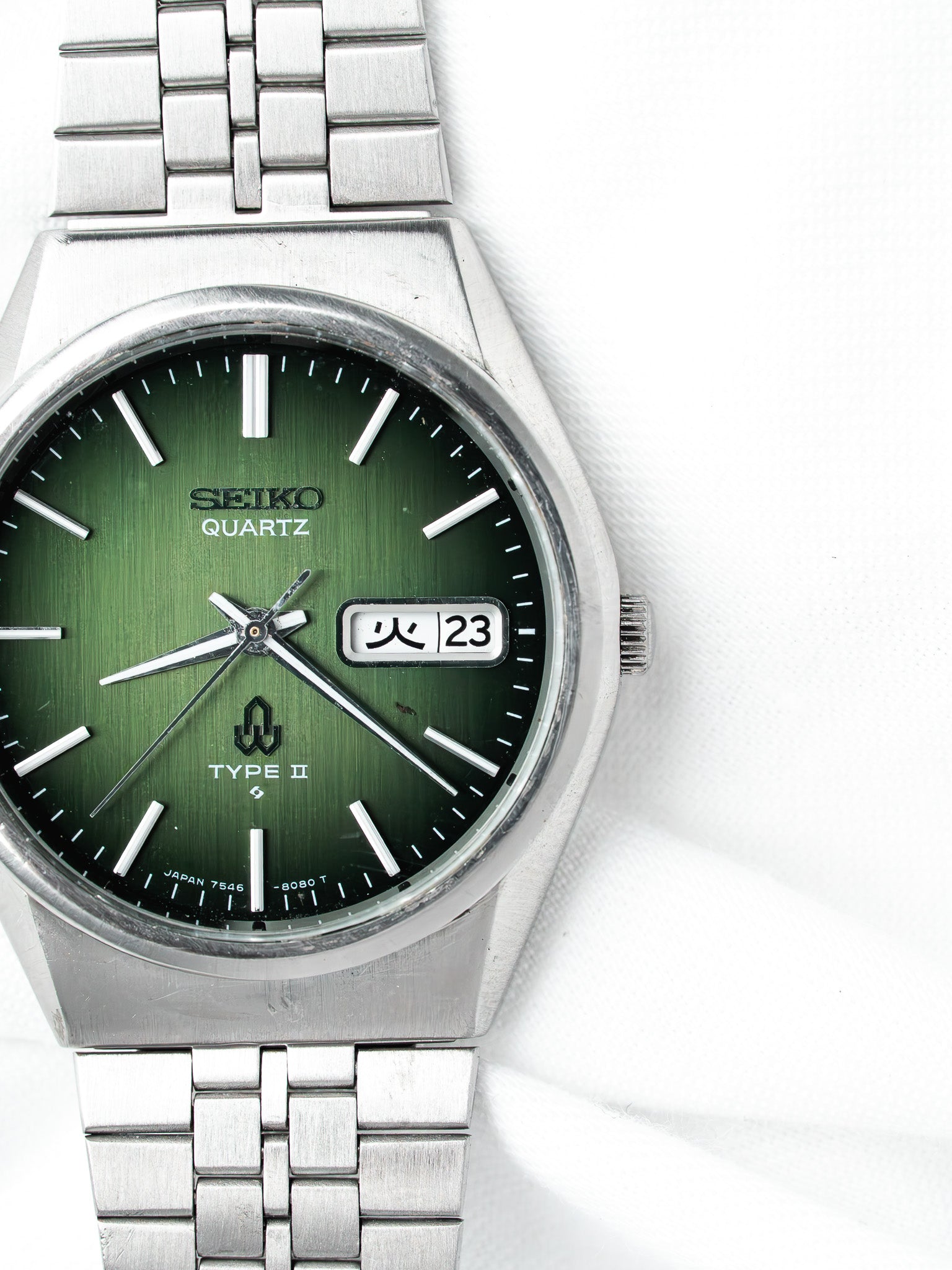 Seiko Quartz Type II vintage watch with green dial and steel bracelet