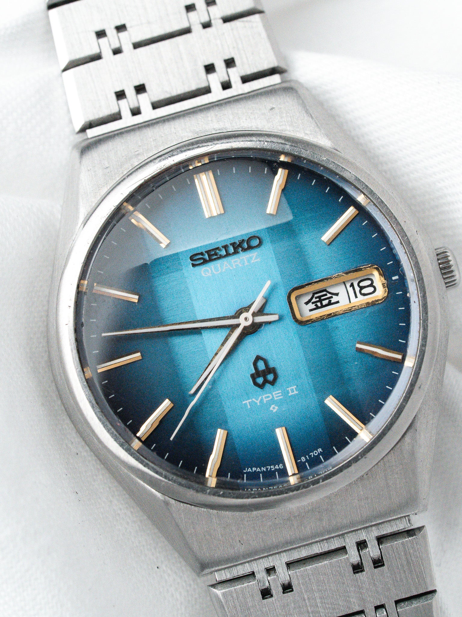 Seiko Quartz Type II vintage watch with blue gradient dial and steel bracelet