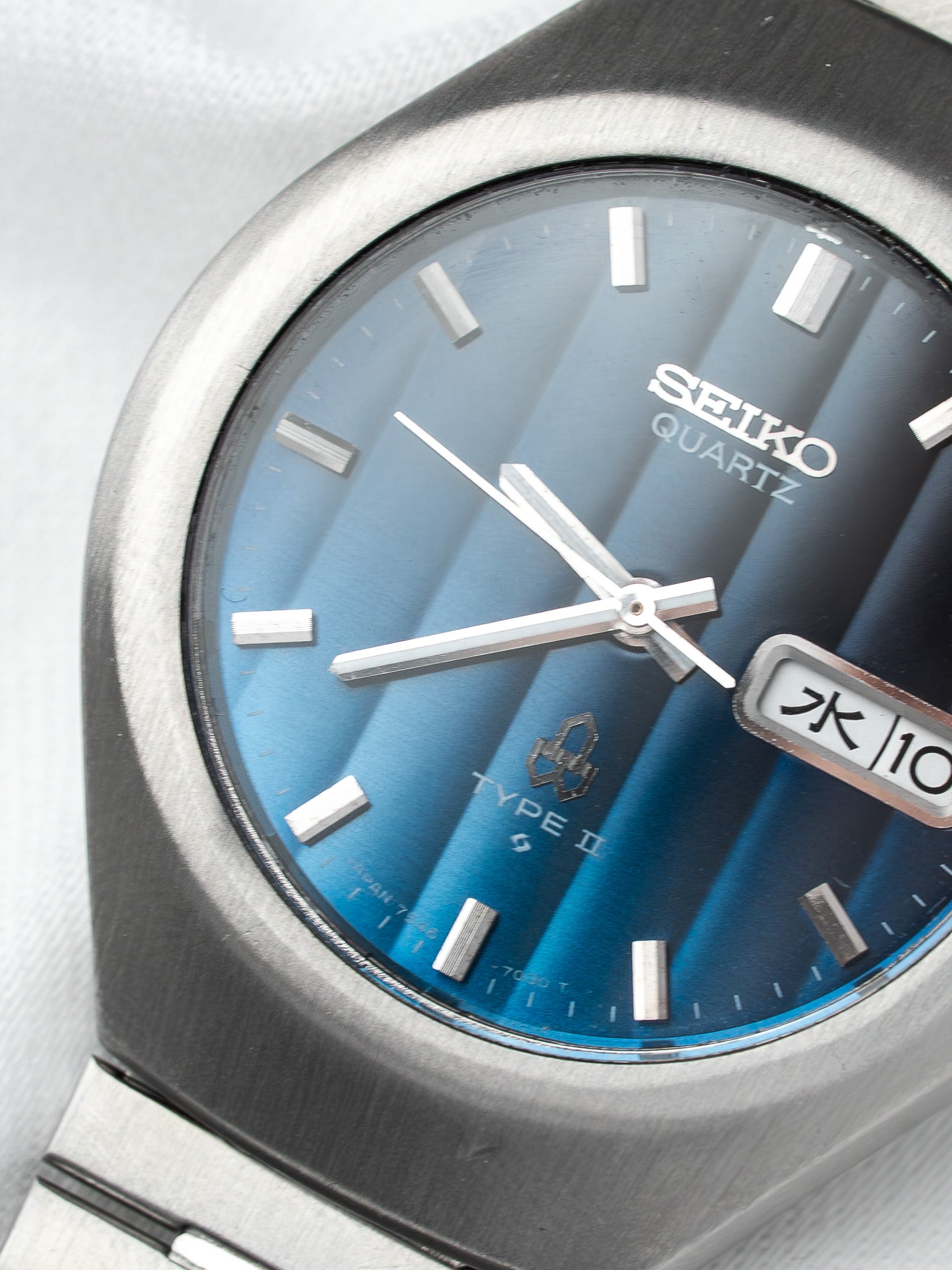 Seiko Type II vintage quartz watch with blue sunburst dial and day-date window