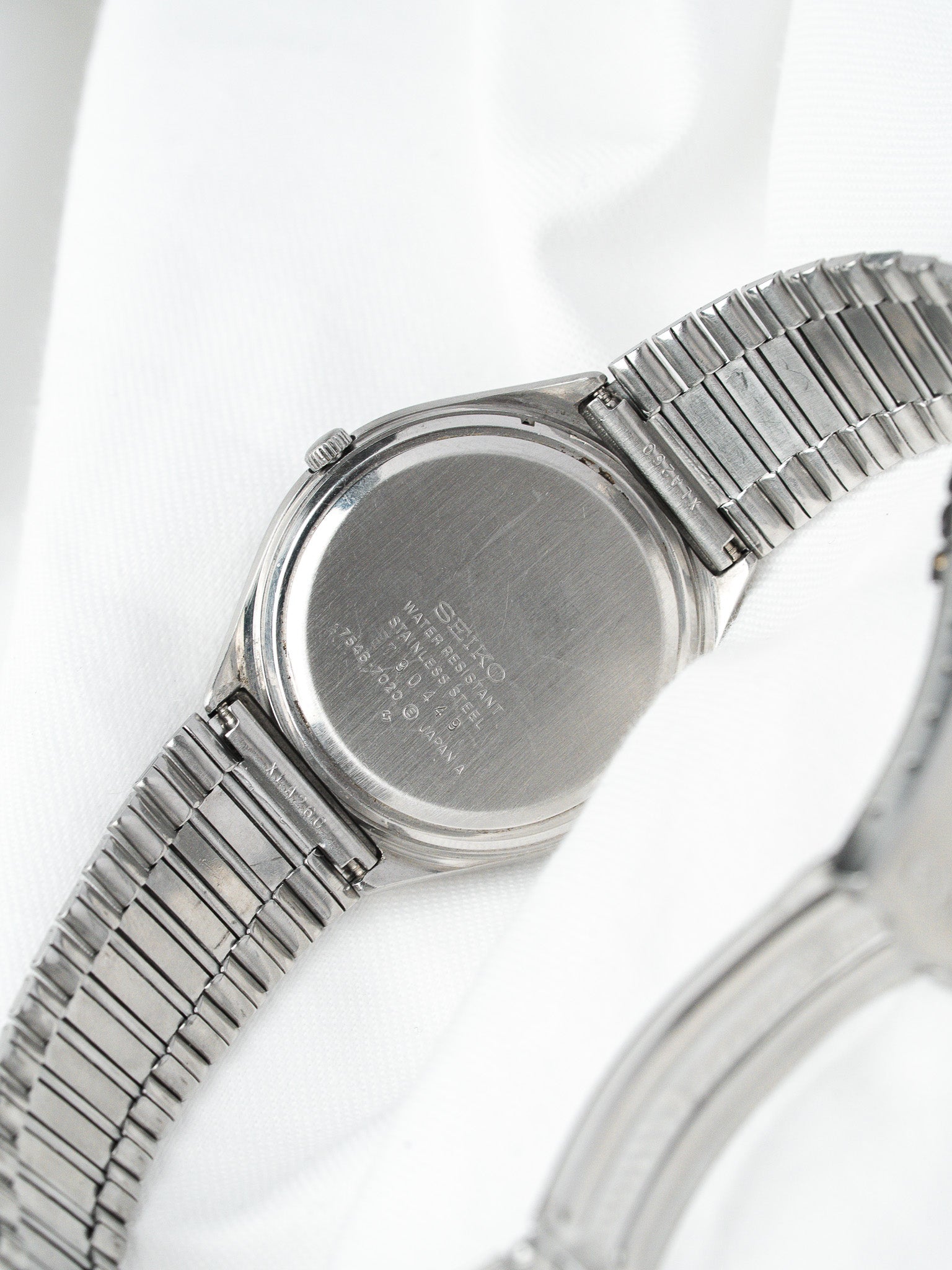 Seiko vintage watch back, stainless steel case and bracelet, water resistant engraving visible