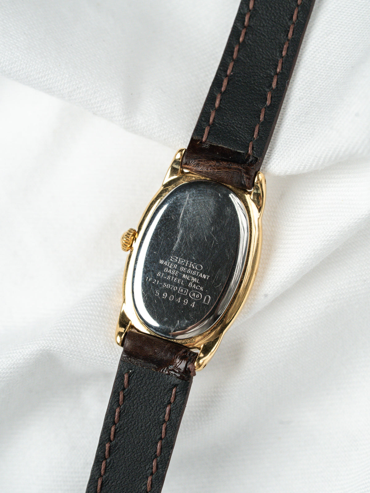 Fond de boîte acier - Montre Seiko 1F21-5B70 plaqué or - Atelier Victor