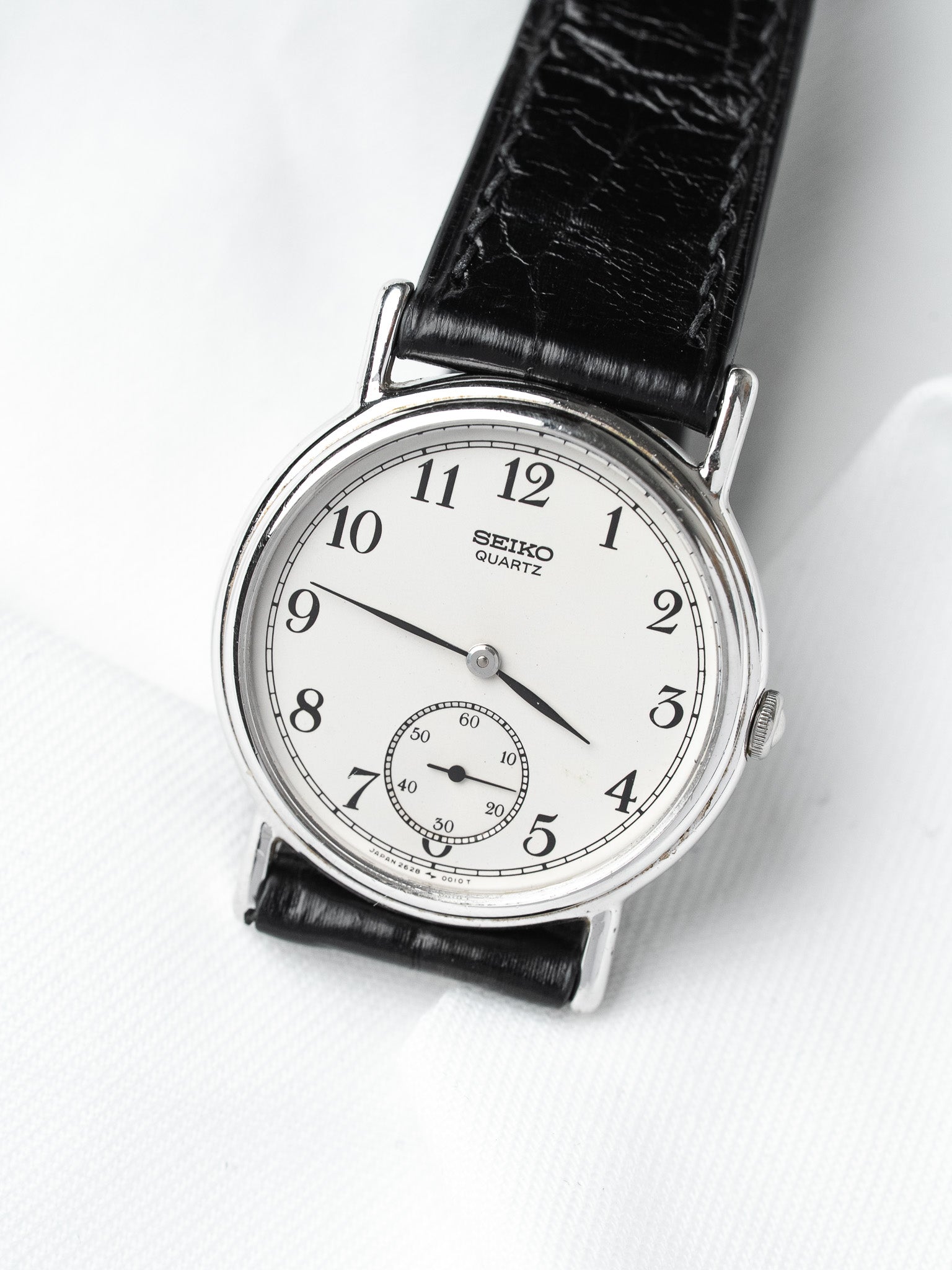 Винтажные часы Seiko из стали — малая секундная стрелка, белый циферблат (1983)