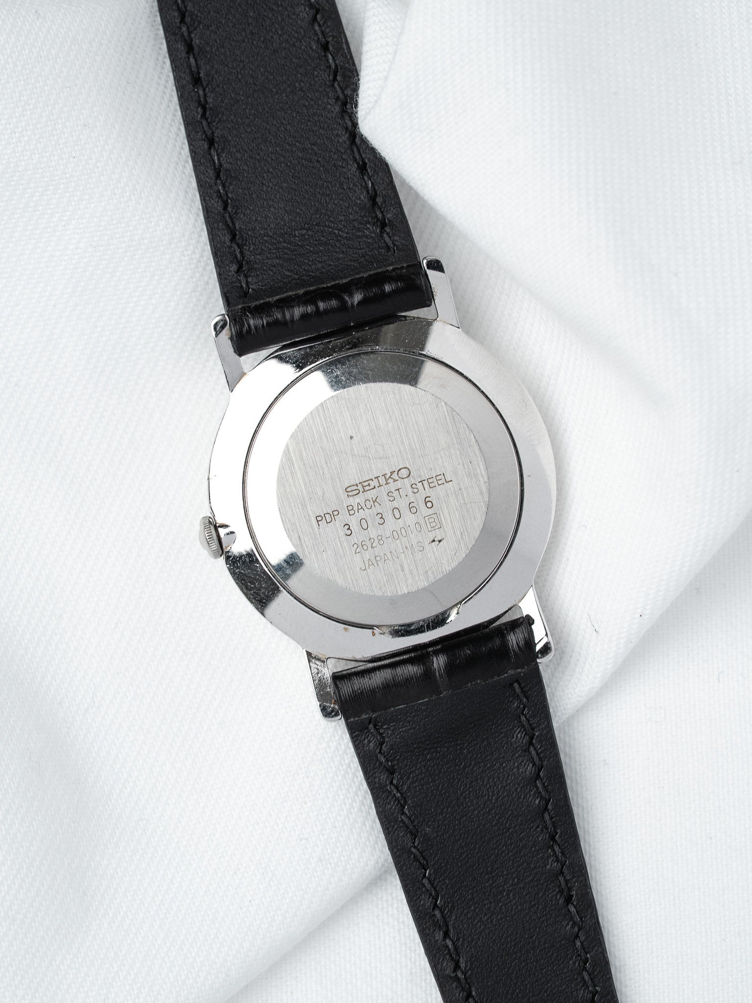 Винтажные часы Seiko из стали — малая секундная стрелка, белый циферблат (1983)