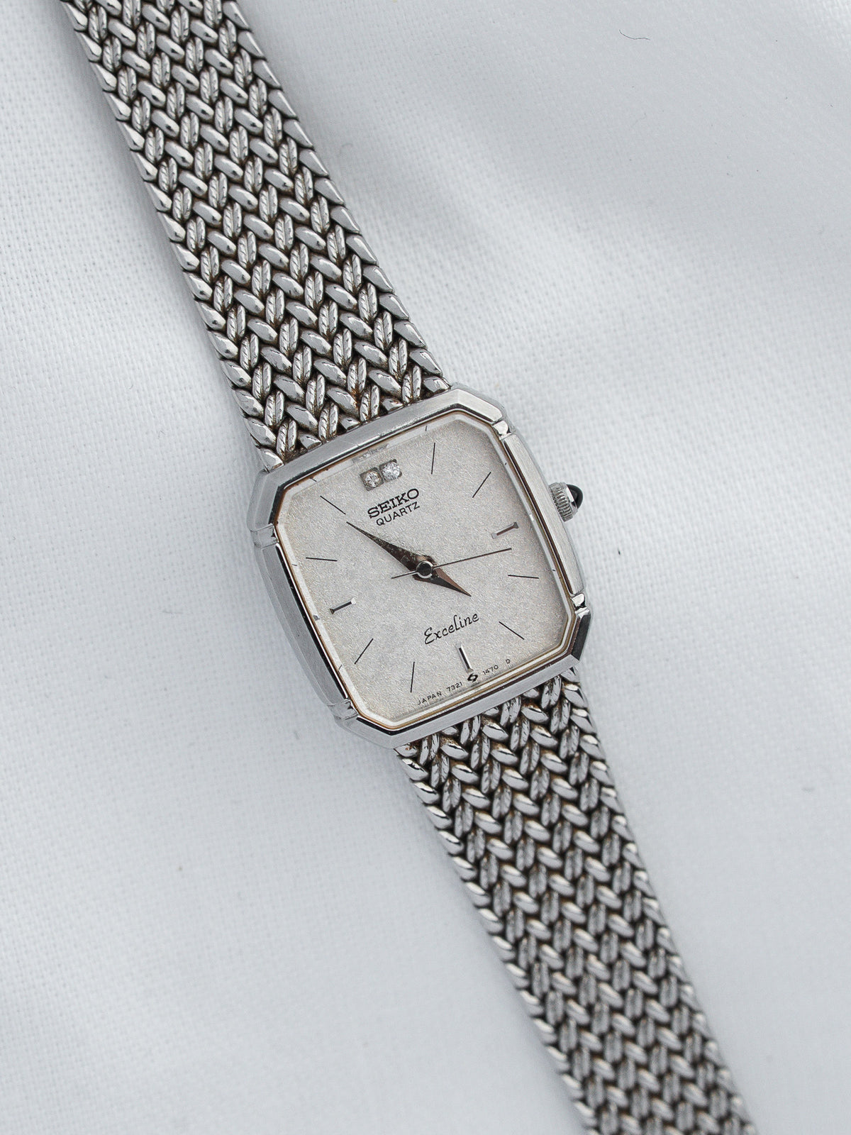 Seiko Exceline vintage quartz watch with silver dial and mesh bracelet