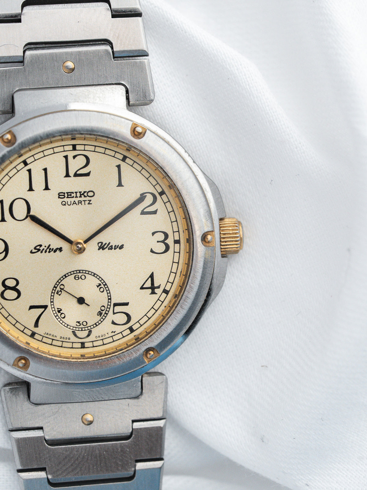 Seiko Silver Wave vintage quartz watch with cream dial and steel bracelet