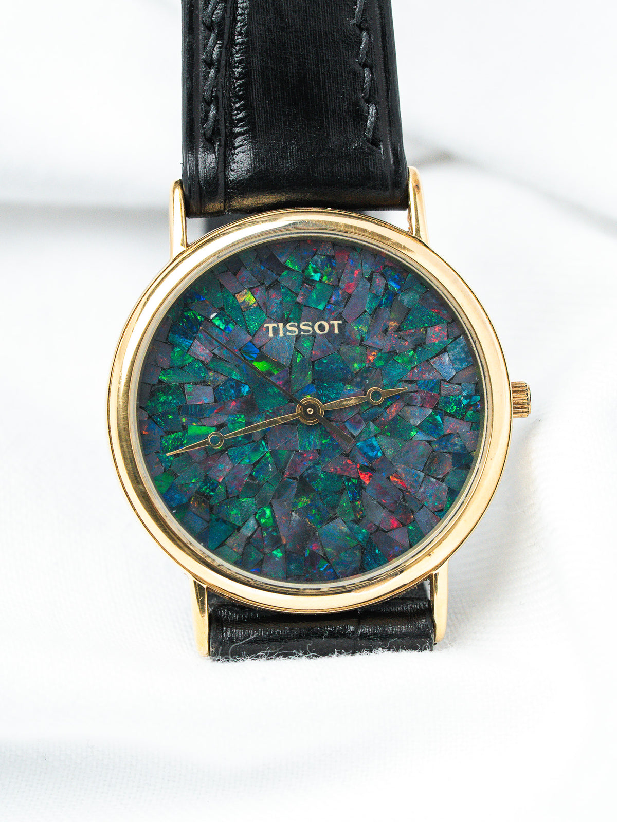 Tissot vintage watch with opal mosaic dial, gold case, black leather strap
