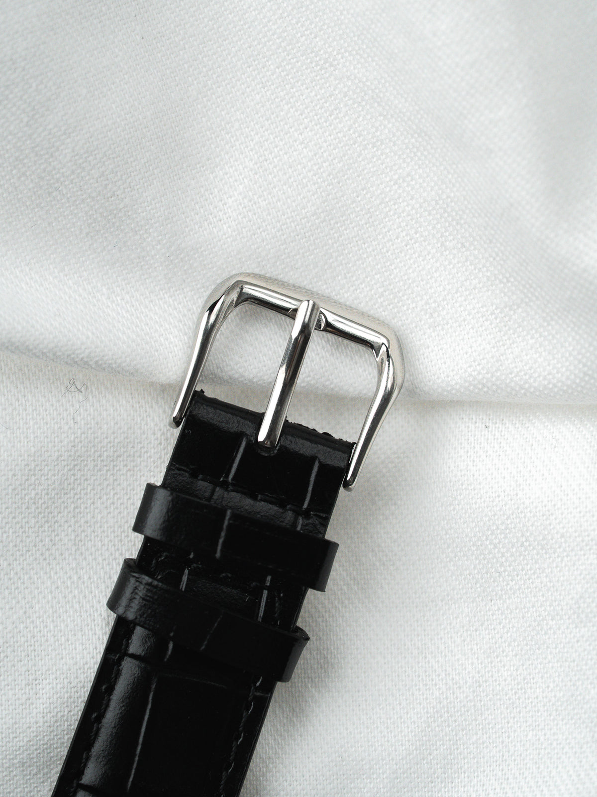 Couronne cannelée et flanc du boîtier - Montre Tissot Petite Seconde Acier 1956 - Atelier Victor