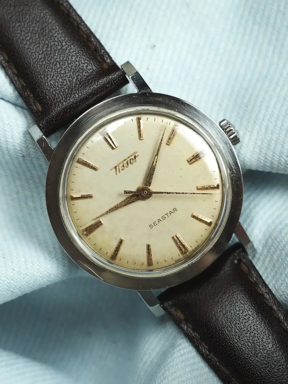 Tissot Seastar vintage watch with cream dial, gold markers, brown leather strap