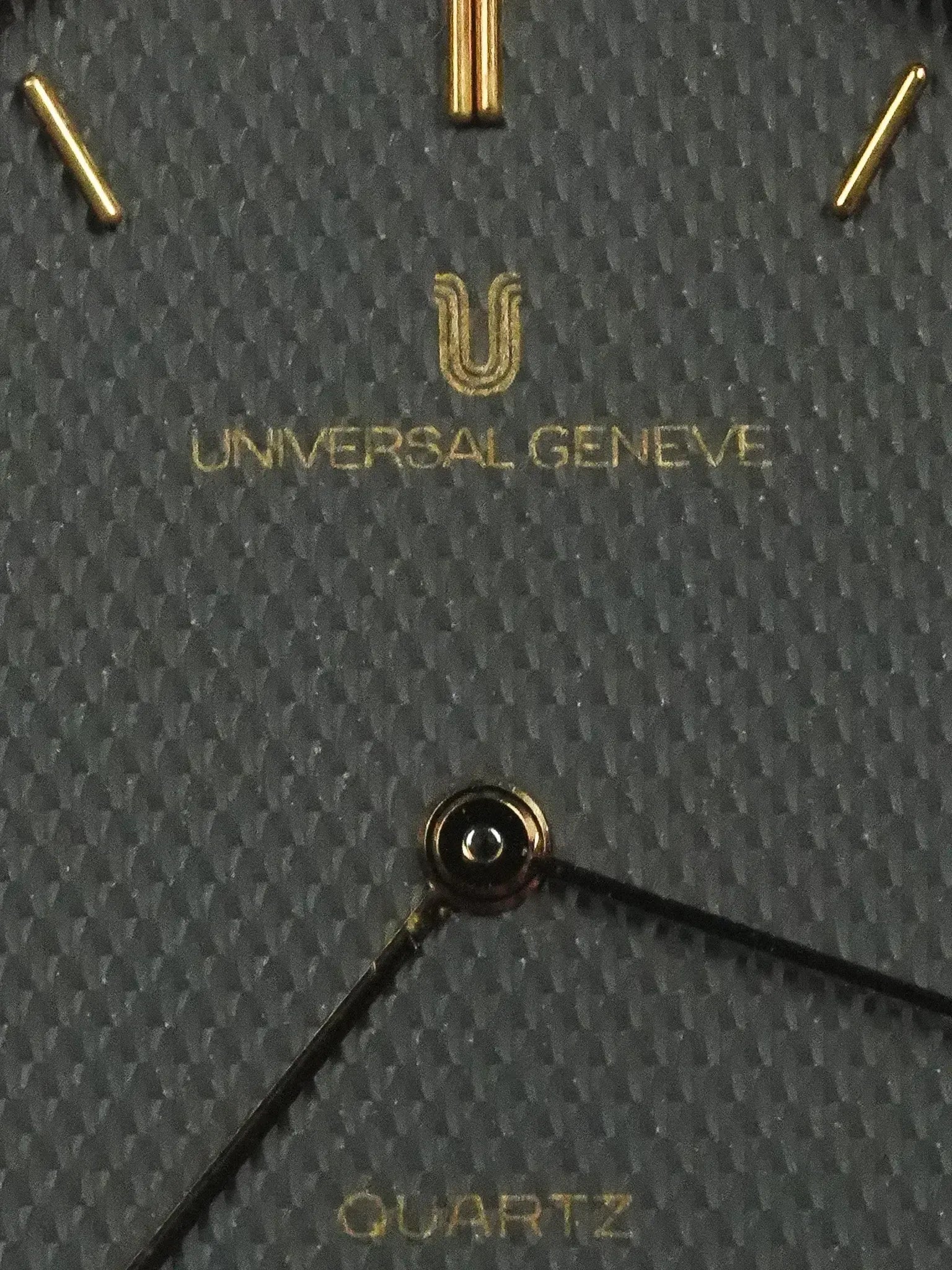 Universal Geneve vintage watch with textured grey dial and gold markers