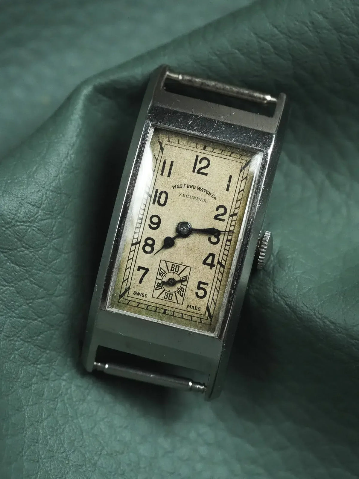 Vintage West End Watch Co. Secundus rectangular watch with cream dial on green leather