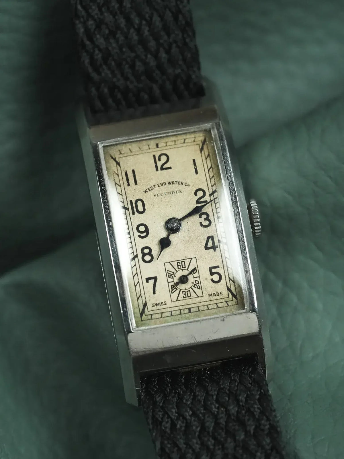 West End Watch Co vintage rectangular watch with cream dial and black fabric strap