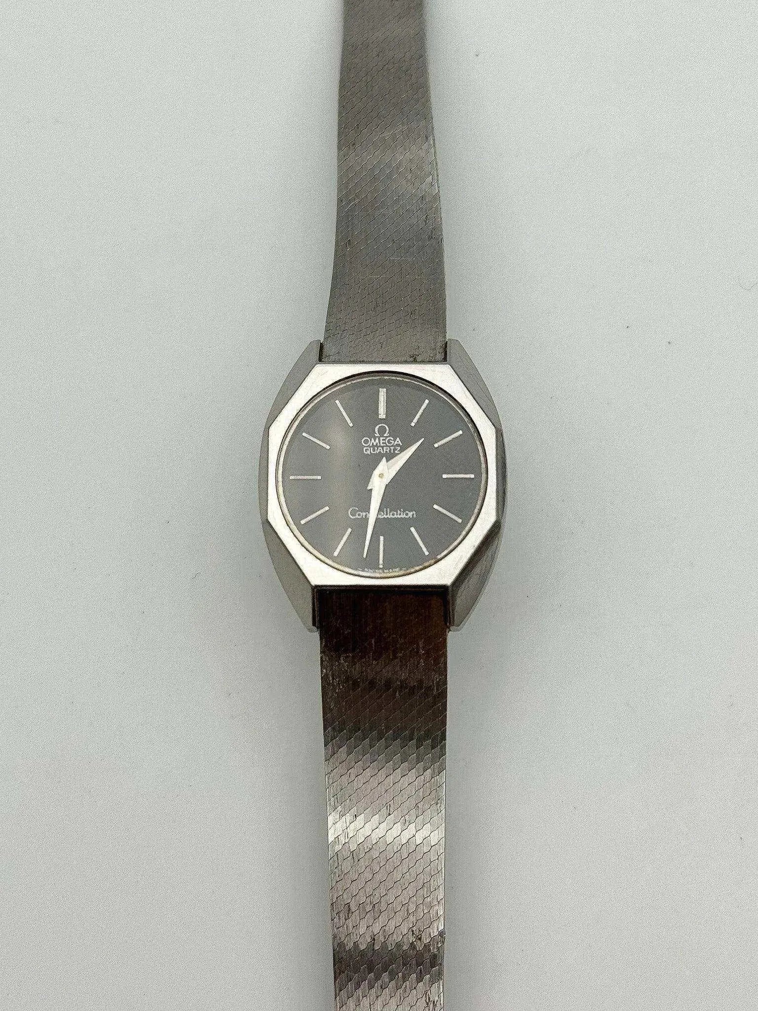 Omega - MIni Constellation 591.0006 Octogonale Noir Acier - 1976 - Atelier Victor - Vintage Shop