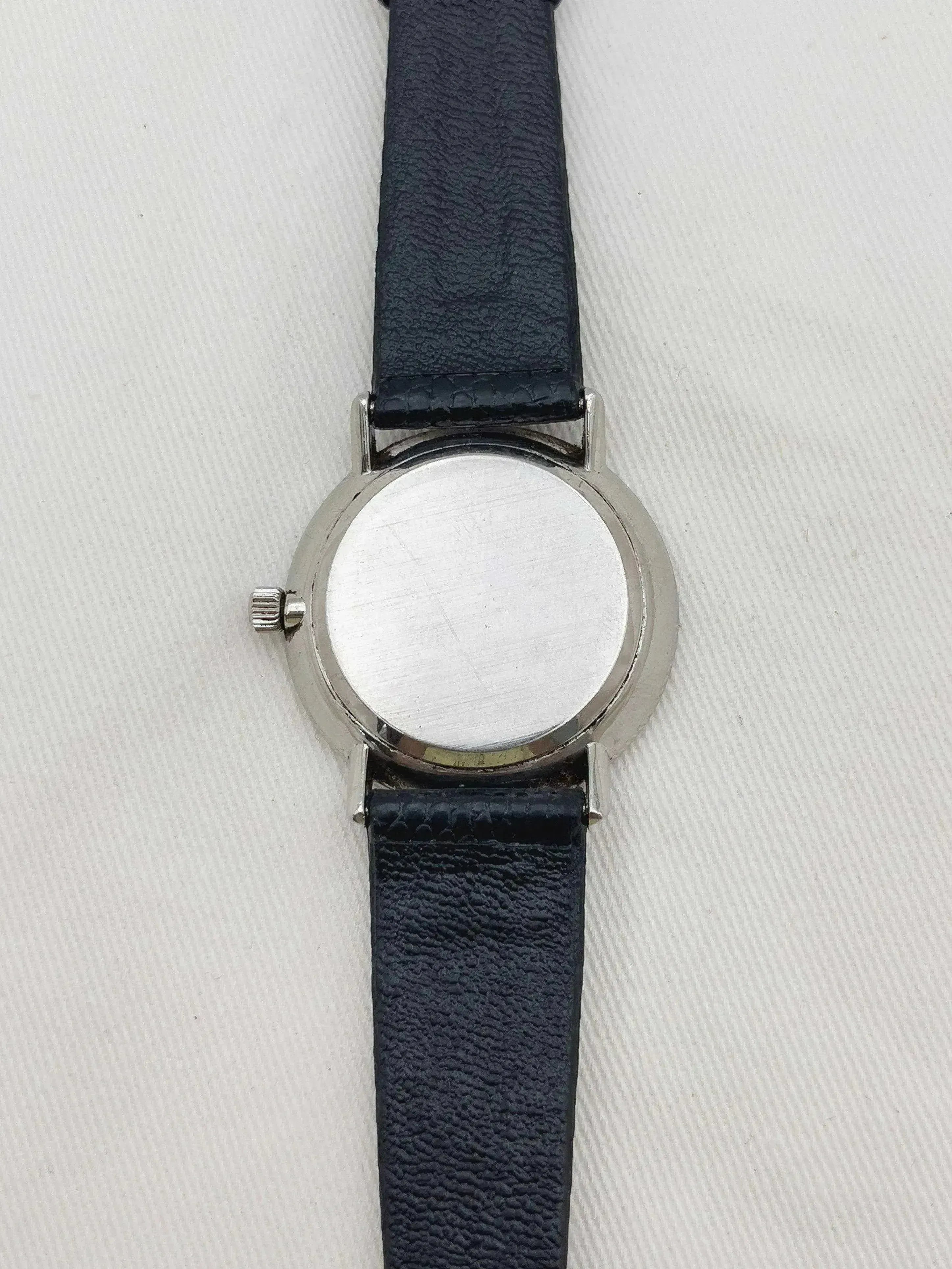 Omega - Ronde patine cadran argent - 1976 - Atelier Victor