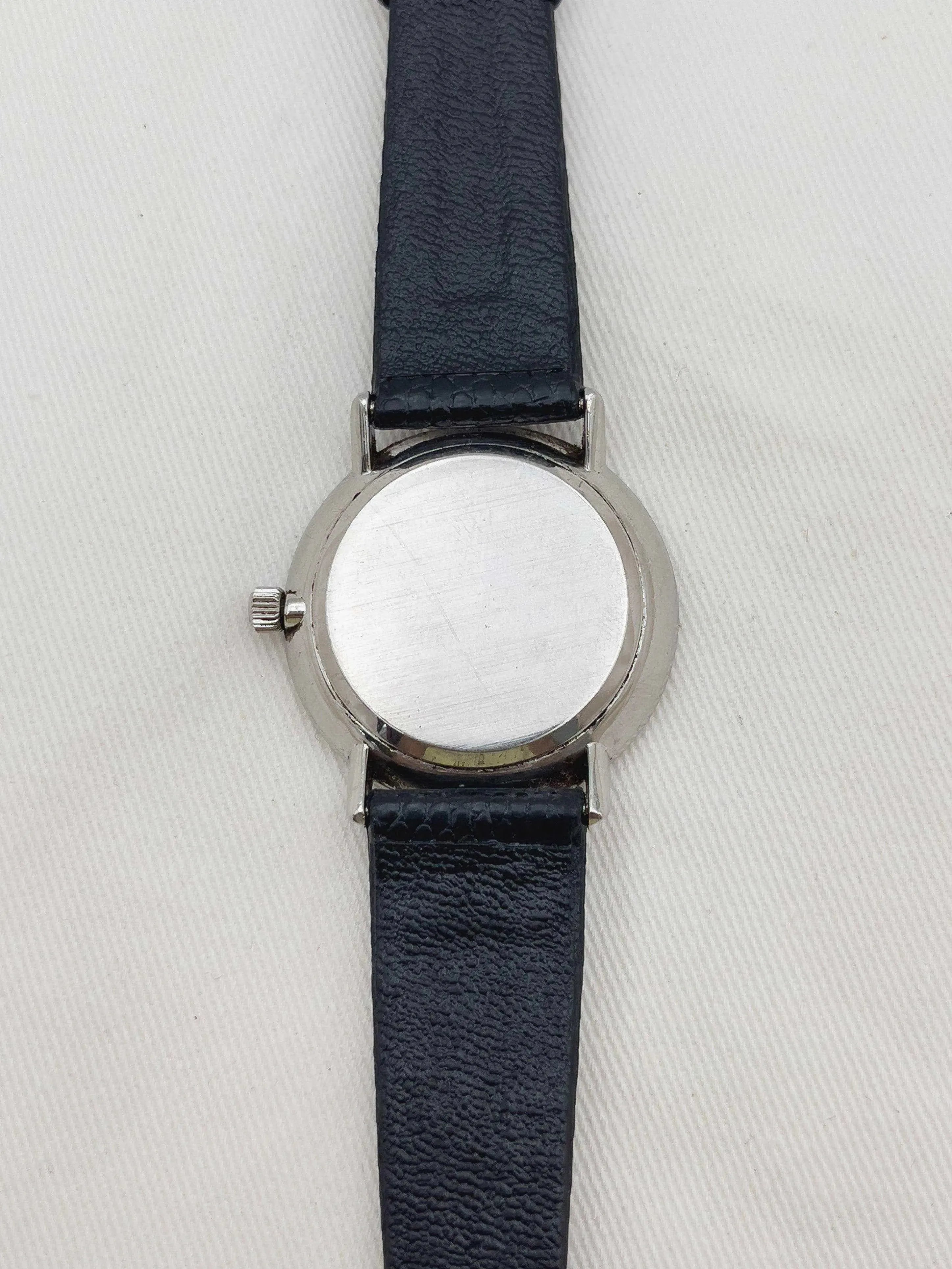 Omega - Ronde patine cadran argent - 1976 - Atelier Victor