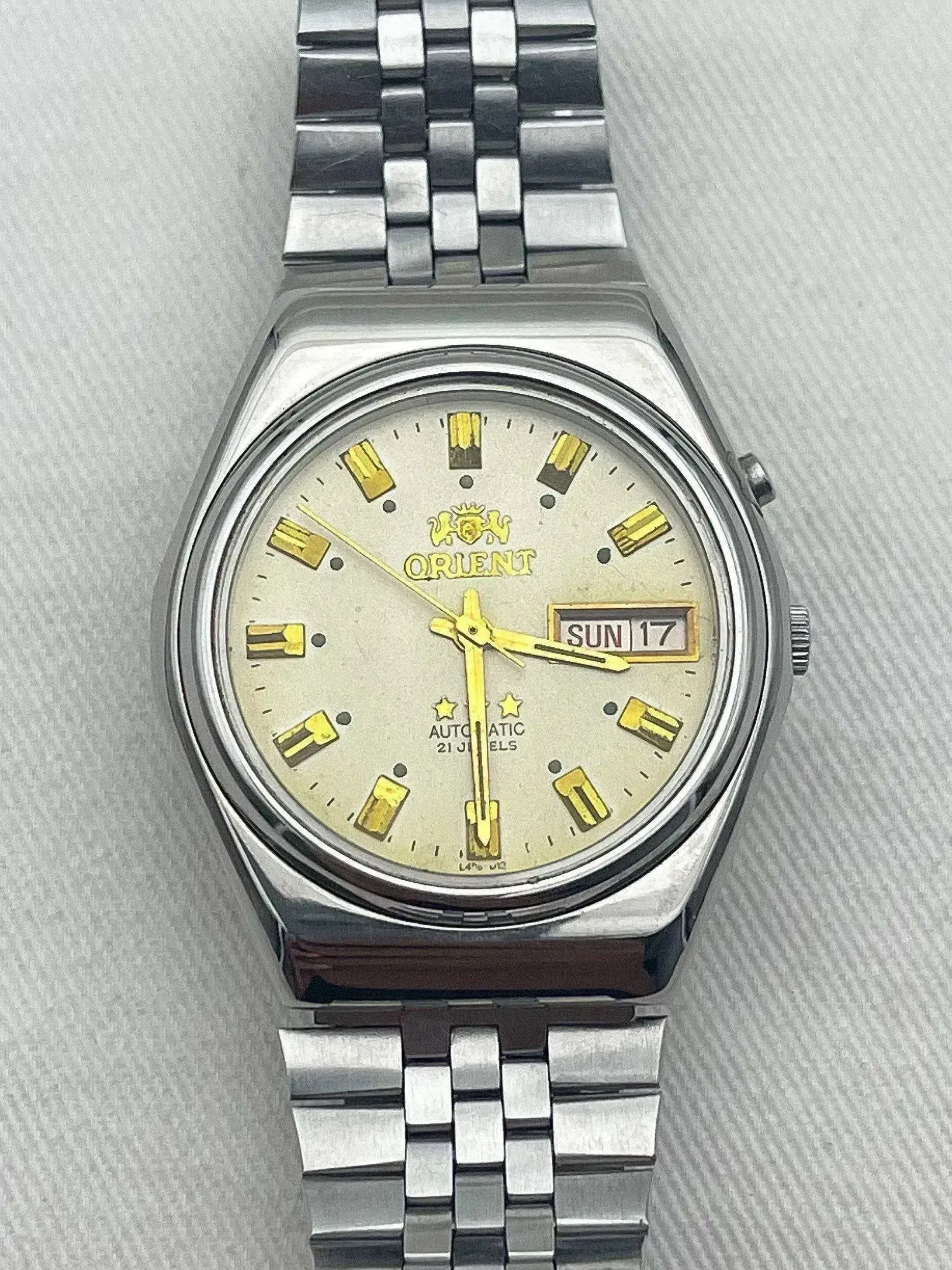 Orient - Daydate cadran beige indewx or - 1980s - Atelier Victor