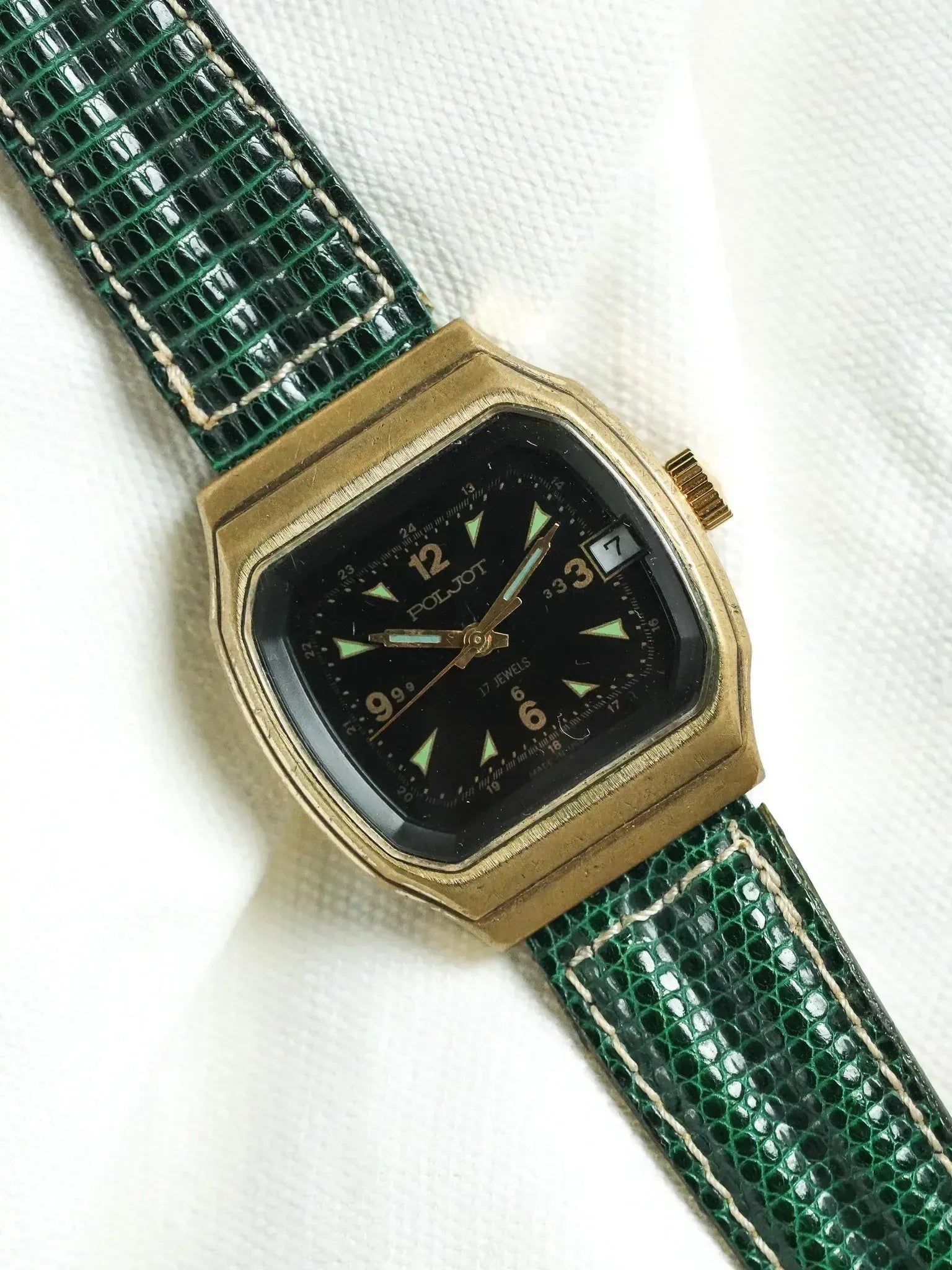 Poljot vintage watch with gold case, black dial, green reptile strap