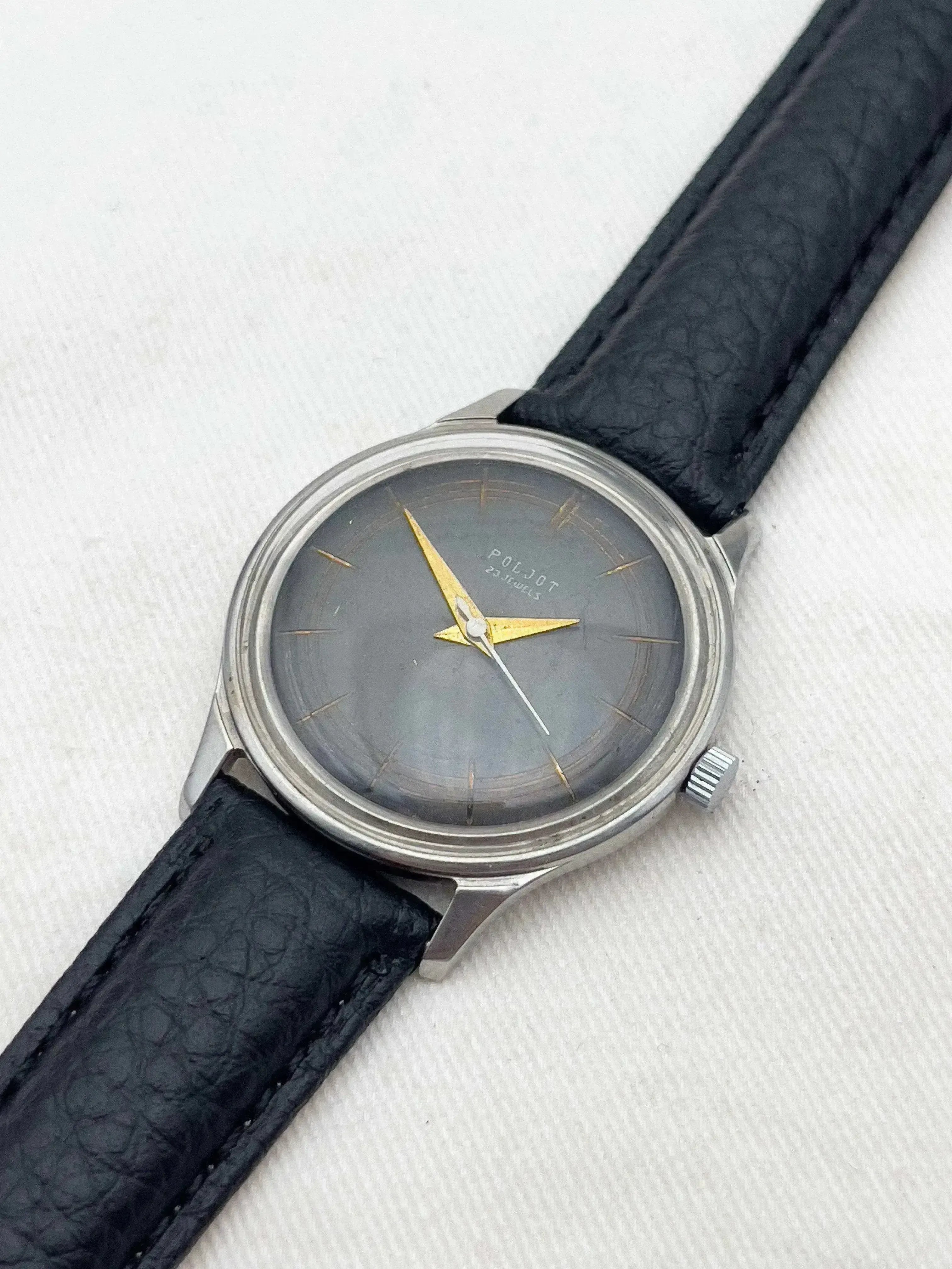 Poljot vintage watch with grey dial, gold hands, steel case, black leather strap