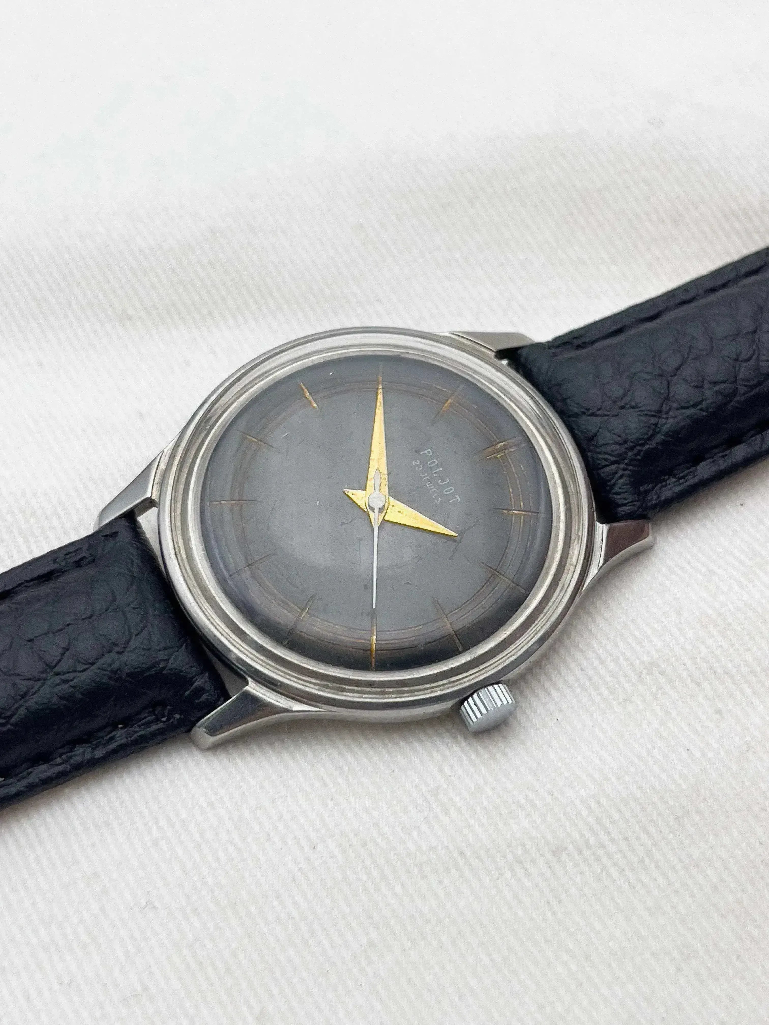 Poljot vintage watch with grey dial, gold hands, steel case, black leather strap