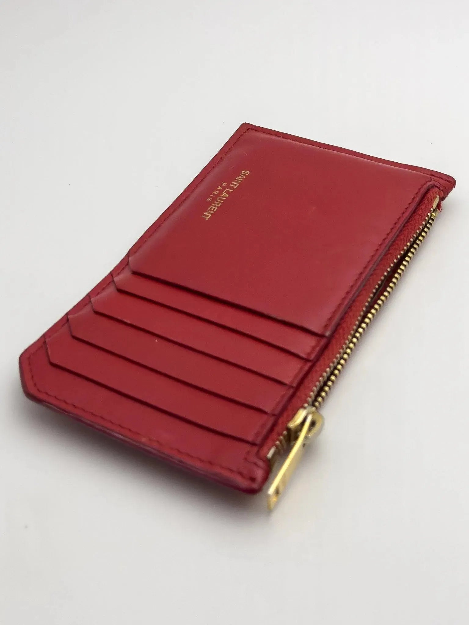 Saint Laurent - Portefeuille en cuir rouge - Atelier Victor Paris - Vintage Watch Shop Dubai