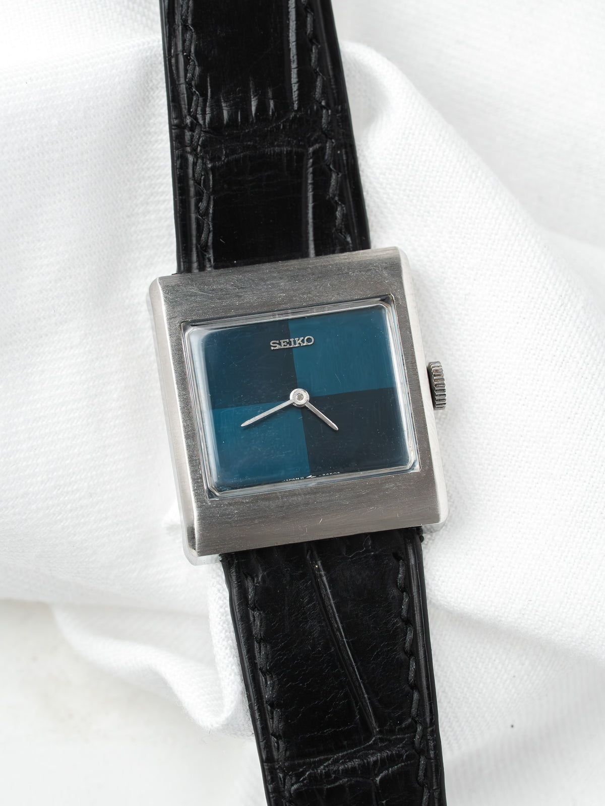 Seiko vintage watch with square case, blue dial, black leather strap