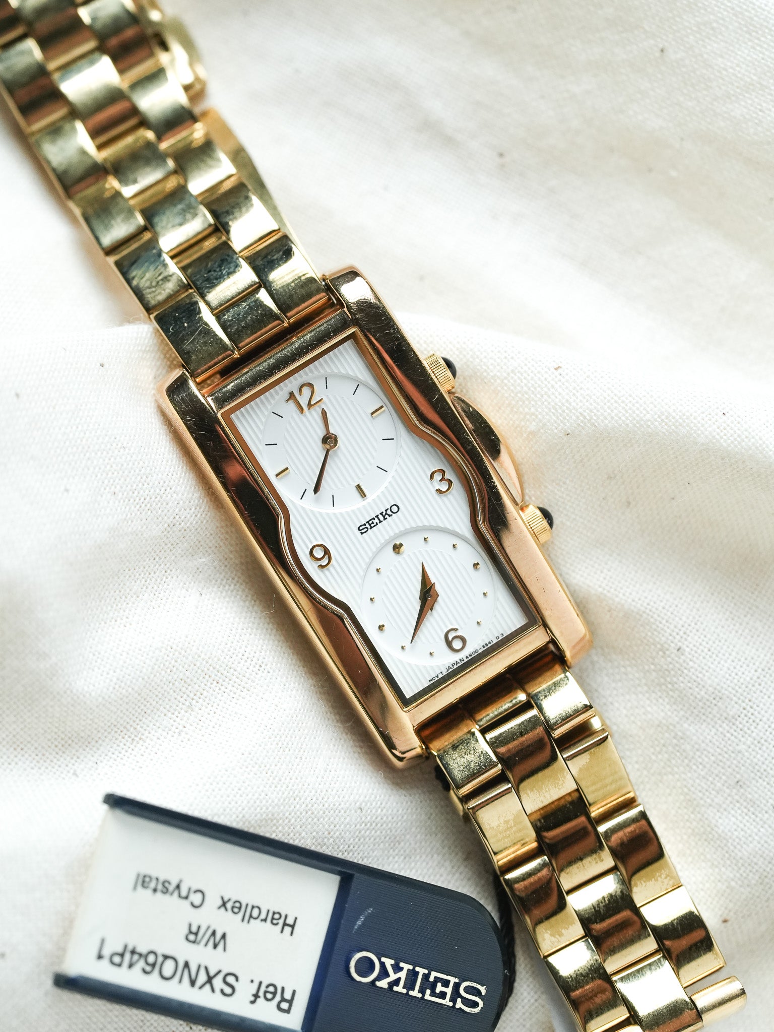 Seiko - Double fuseaux Tank Allongée Tapissée Blanc - NOS - 1997 - Atelier Victor - Vintage Shop