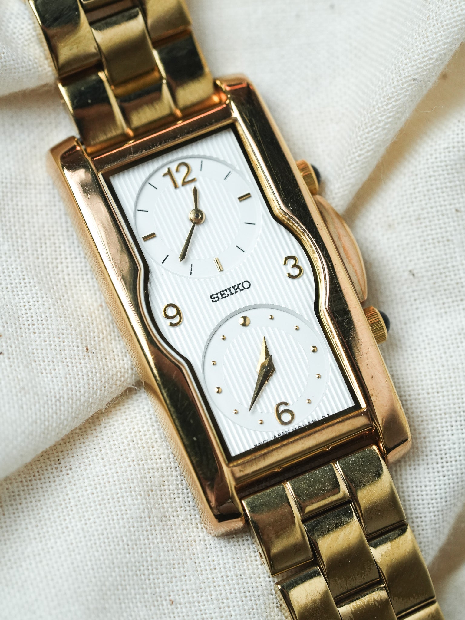 Seiko - Double fuseaux Tank Allongée Tapissée Blanc - NOS - 1997 - Atelier Victor - Vintage Shop
