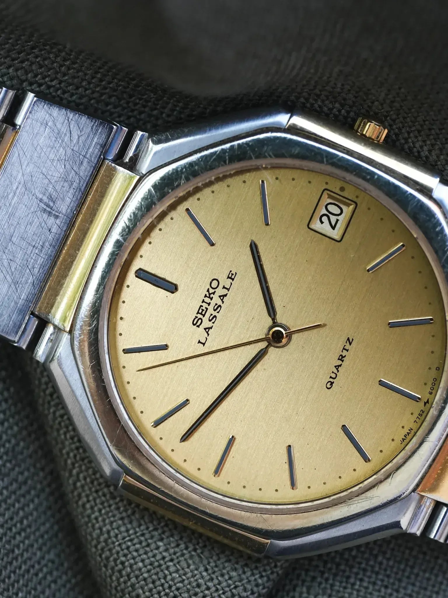 Seiko Lassale vintage watch with gold dial, date window, and two-tone bracelet