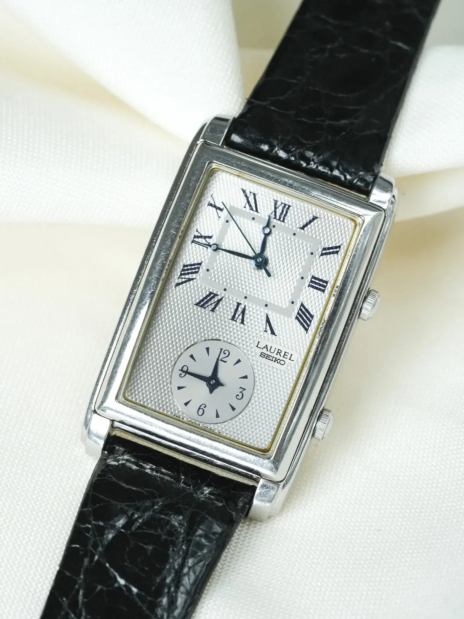 Seiko - Laurel Tank "stepped case" Acier Deux mouvements - 1996