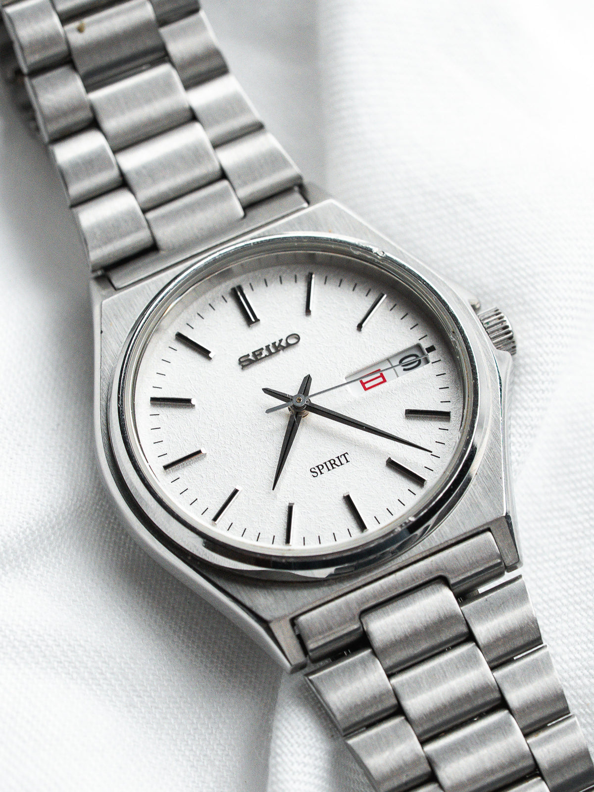 Seiko Spirit vintage watch with silver dial and steel bracelet