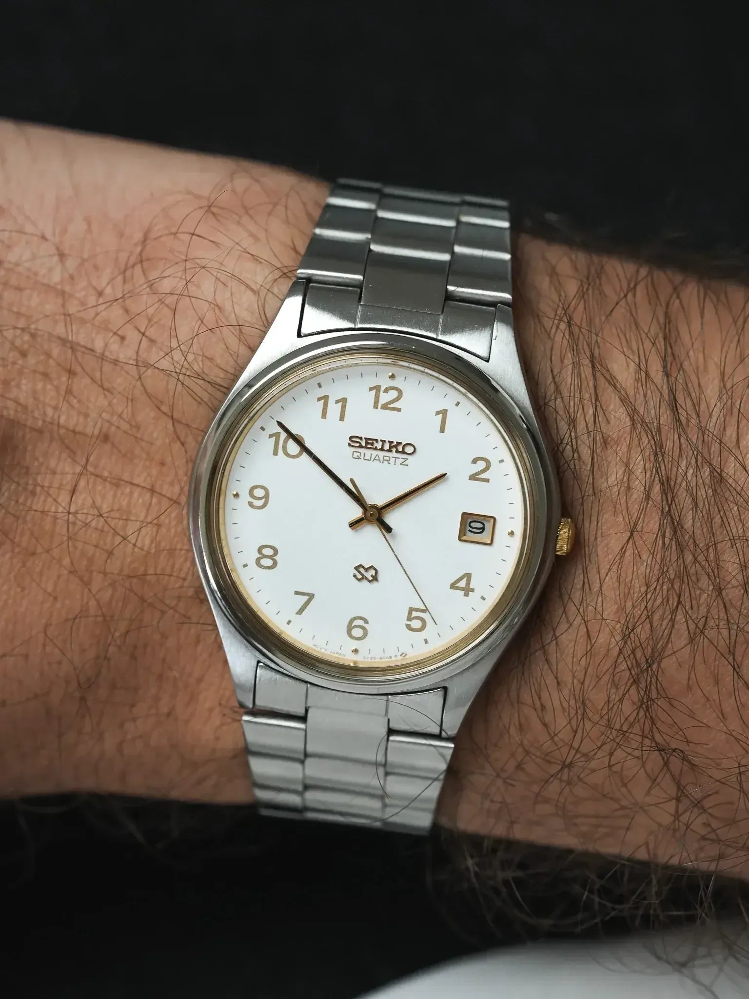 Seiko - SQ Redondo Acero Oro números arábigos fecha - 1988