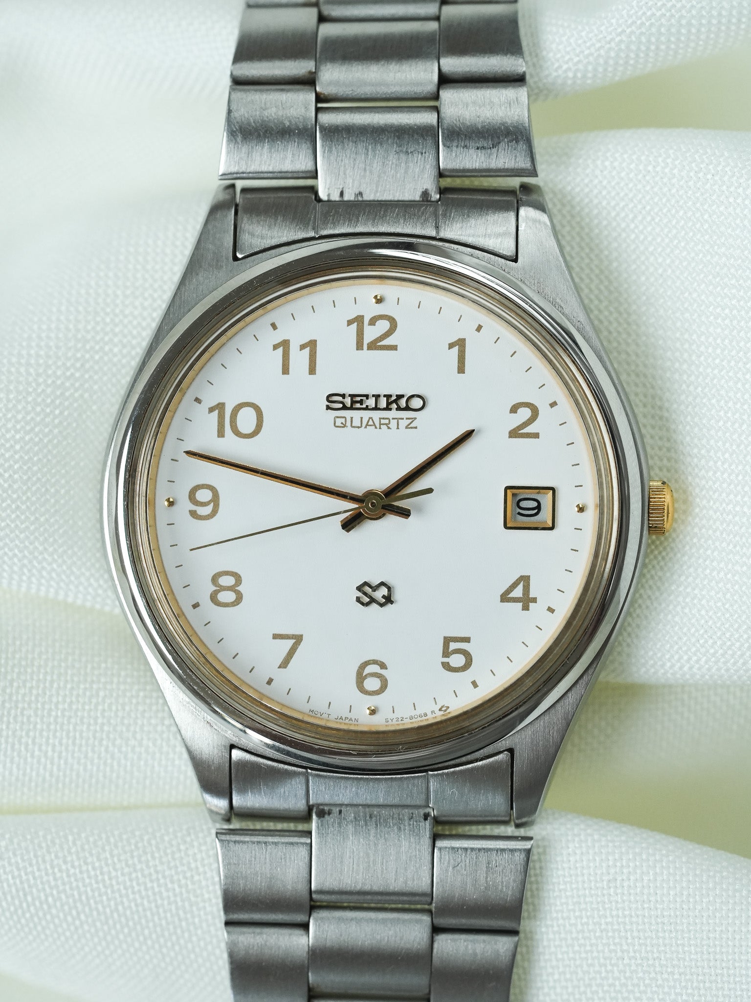 Seiko - SQ Redondo Acero Oro números arábigos fecha - 1988