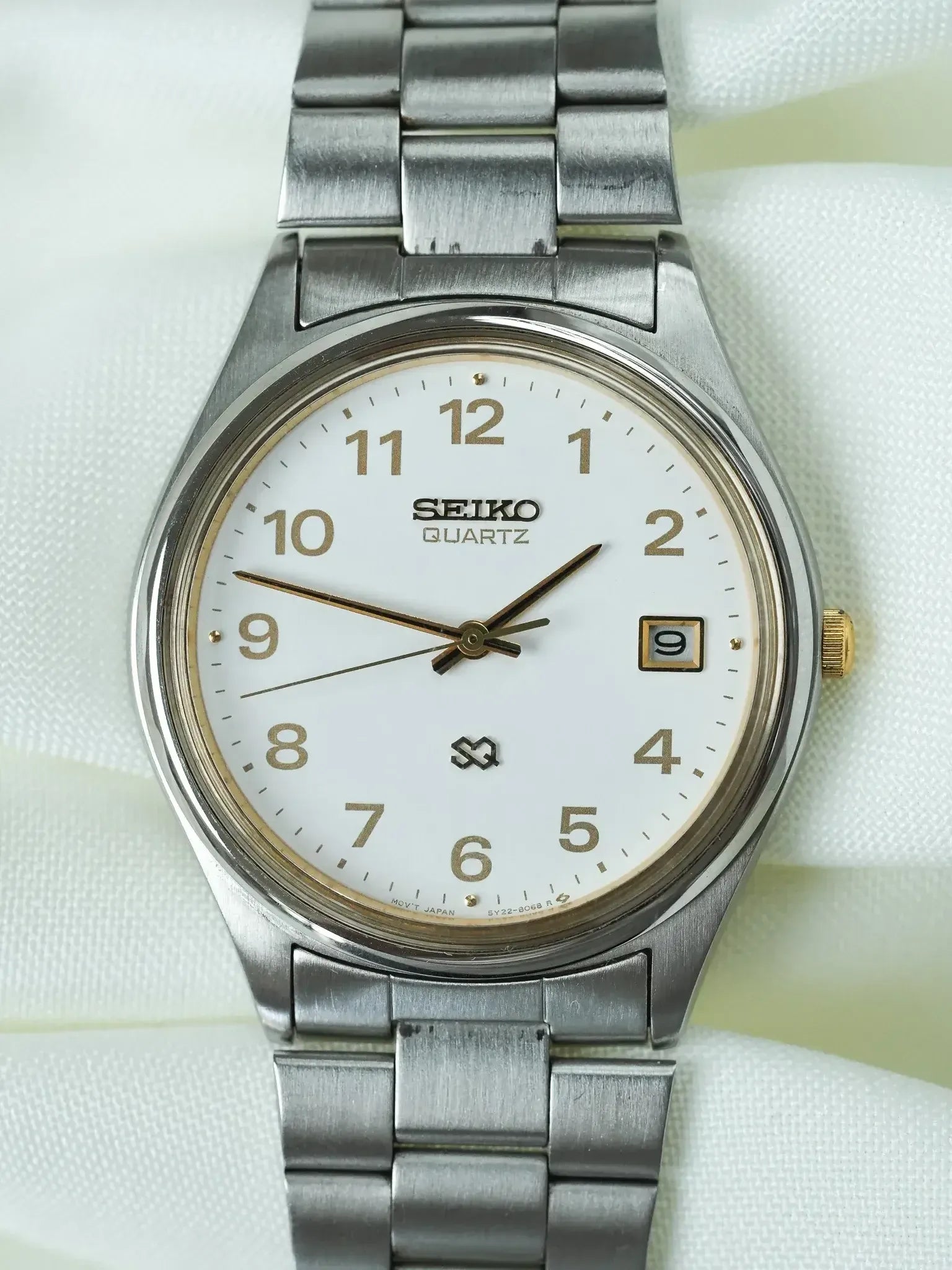 Seiko - SQ Redondo Acero Oro números arábigos fecha - 1988