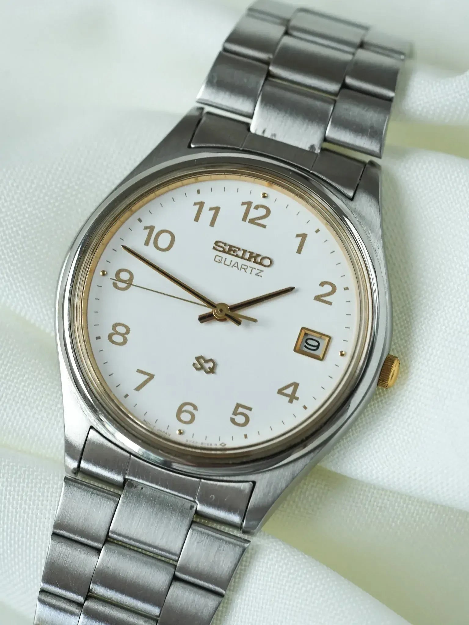 Seiko - SQ Redondo Acero Oro números arábigos fecha - 1988